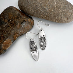 Silver Oval Asymmetrical Earrings