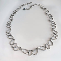 Tumbling Triangles Silver Necklace