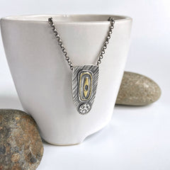 Modern Silver and Gold Pendant