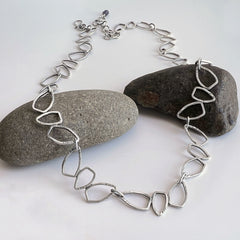 Tumbling Triangles Silver Necklace